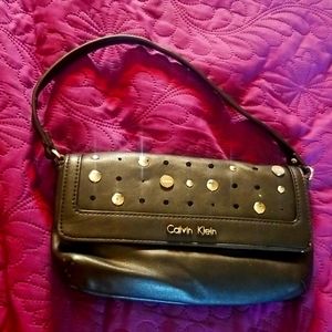 Used Purse in a form of a wallet bag..
